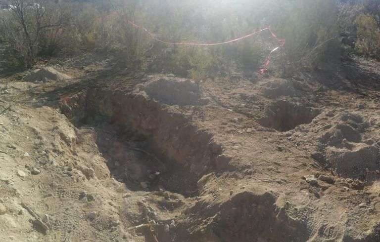 Hallan cuerpo en descomposición y osamenta en fosas clandestinas en Aldama